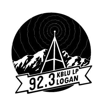 Black-and-white radio station logo with mountains and a transmission tower, reading “92.3 KBLU LP Logan.”